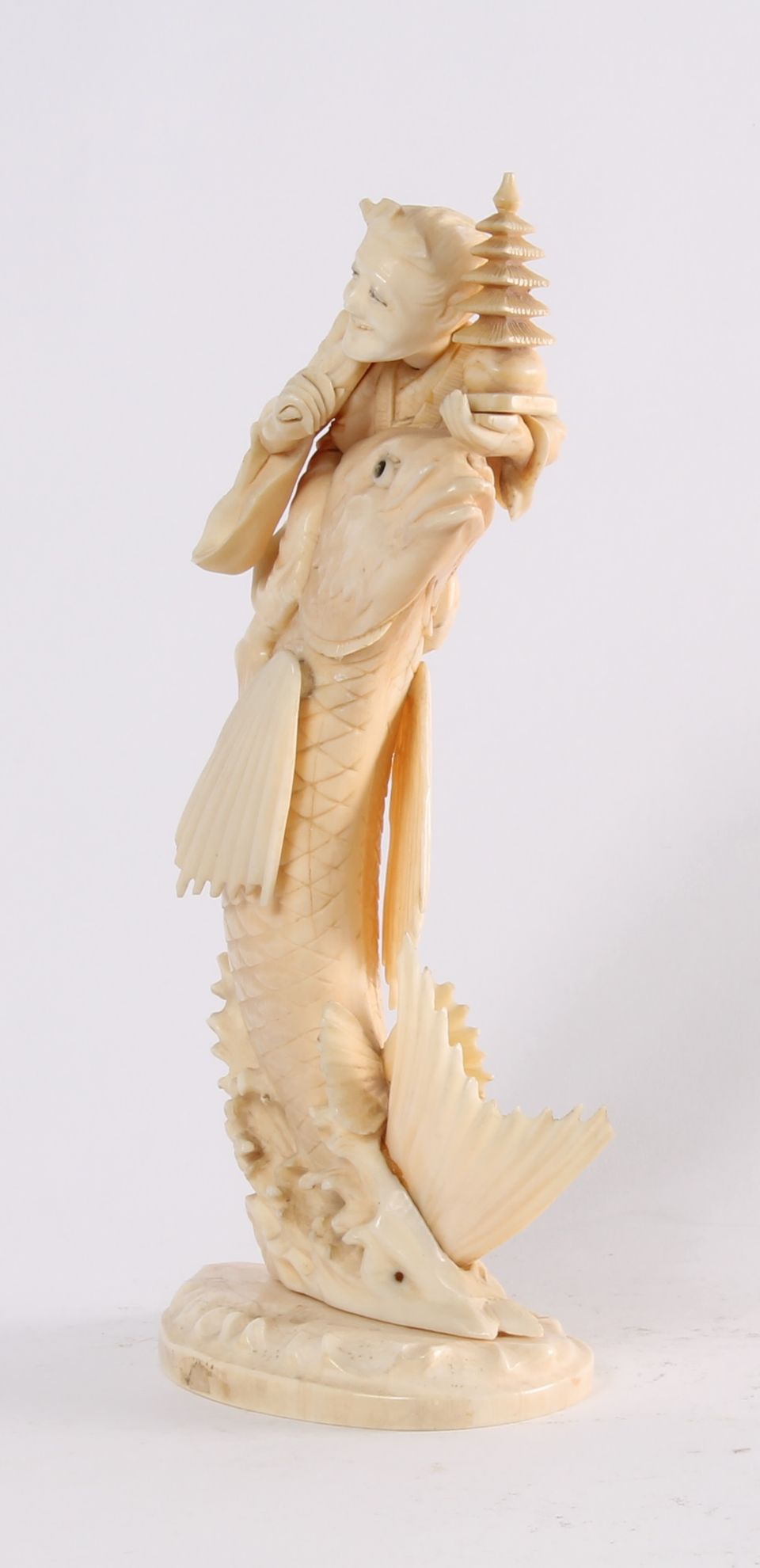 'Man on a Carp', a Japanese carved ivory sculpture, circa 1880 - image 6