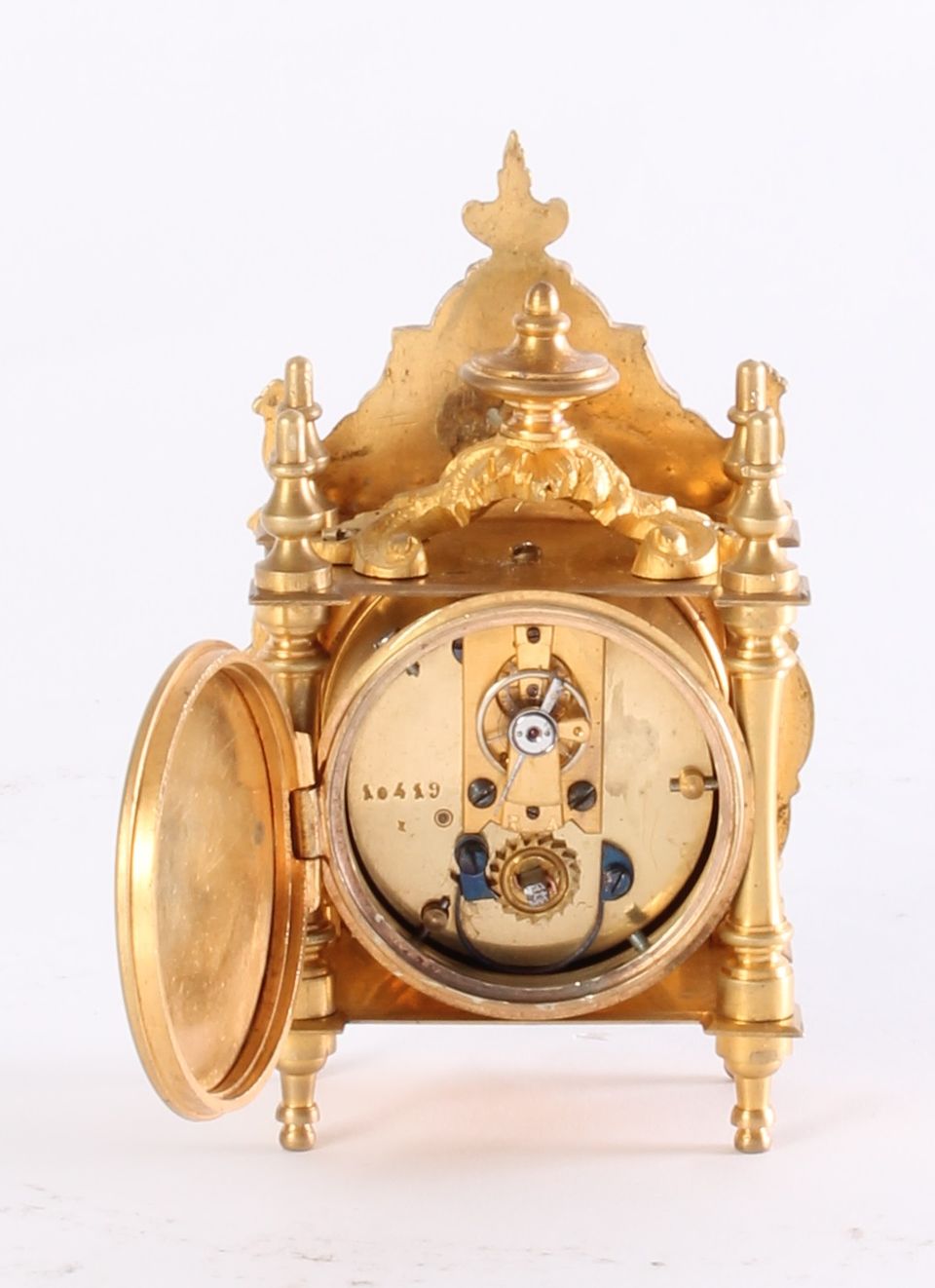 A miniature French Regence-style gilt brass table timepiece, circa 1870. - image 4
