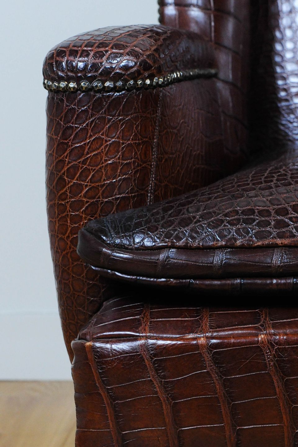 A very unusual and chic crocodile upholstered wing chair. - image 5