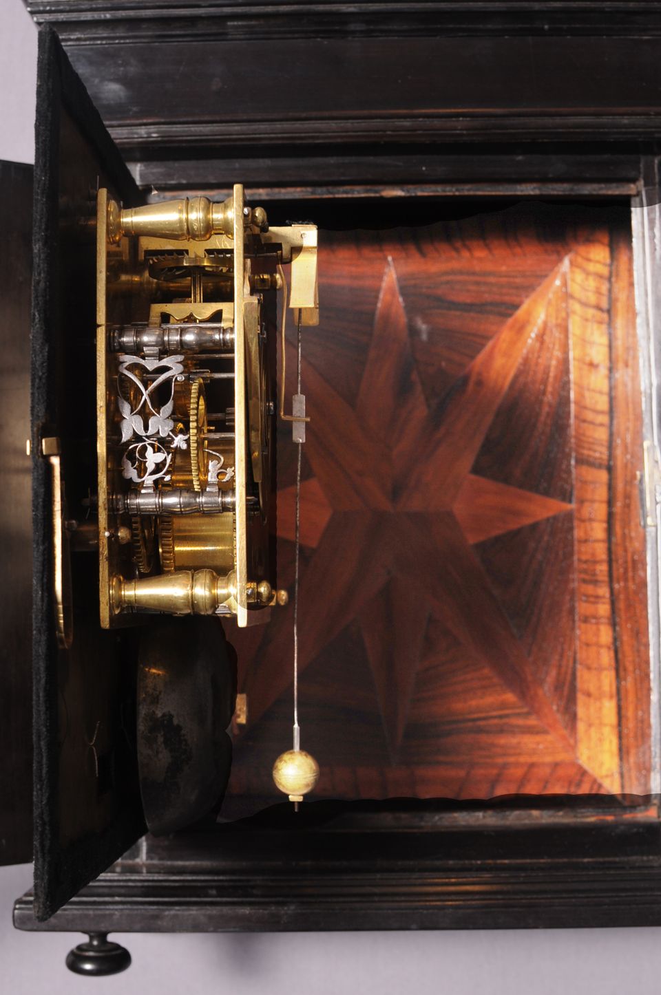 An early Dutch ebony and silvered 'Hague clock', by Christiaan Reynaert Haghe, circa 1665 - image 5
