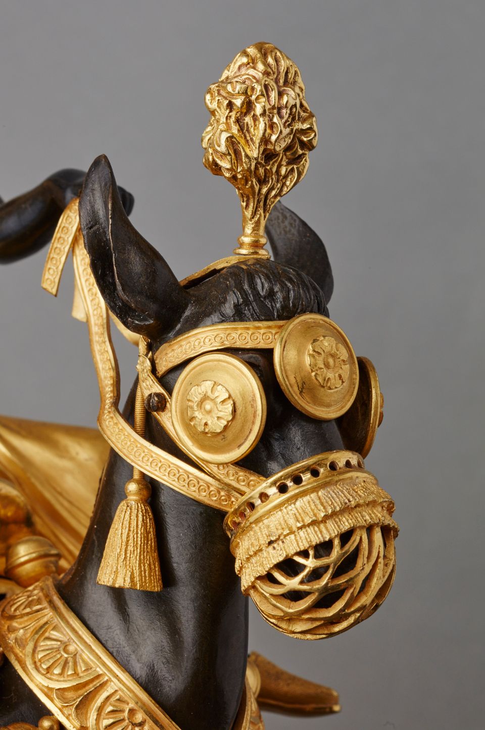 An unusual French ‘Directoire' gilt and patinated bronze mantel clock with young Arab on mule, circa 1800 - image 4
