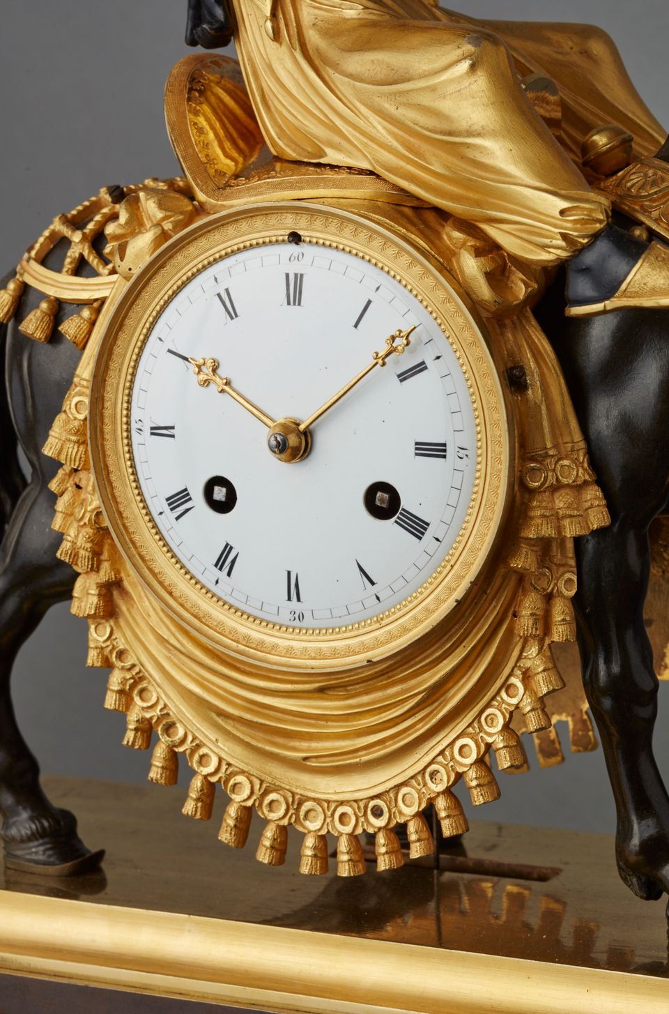An unusual French ‘Directoire' gilt and patinated bronze mantel clock with young Arab on mule, circa 1800 - image 6