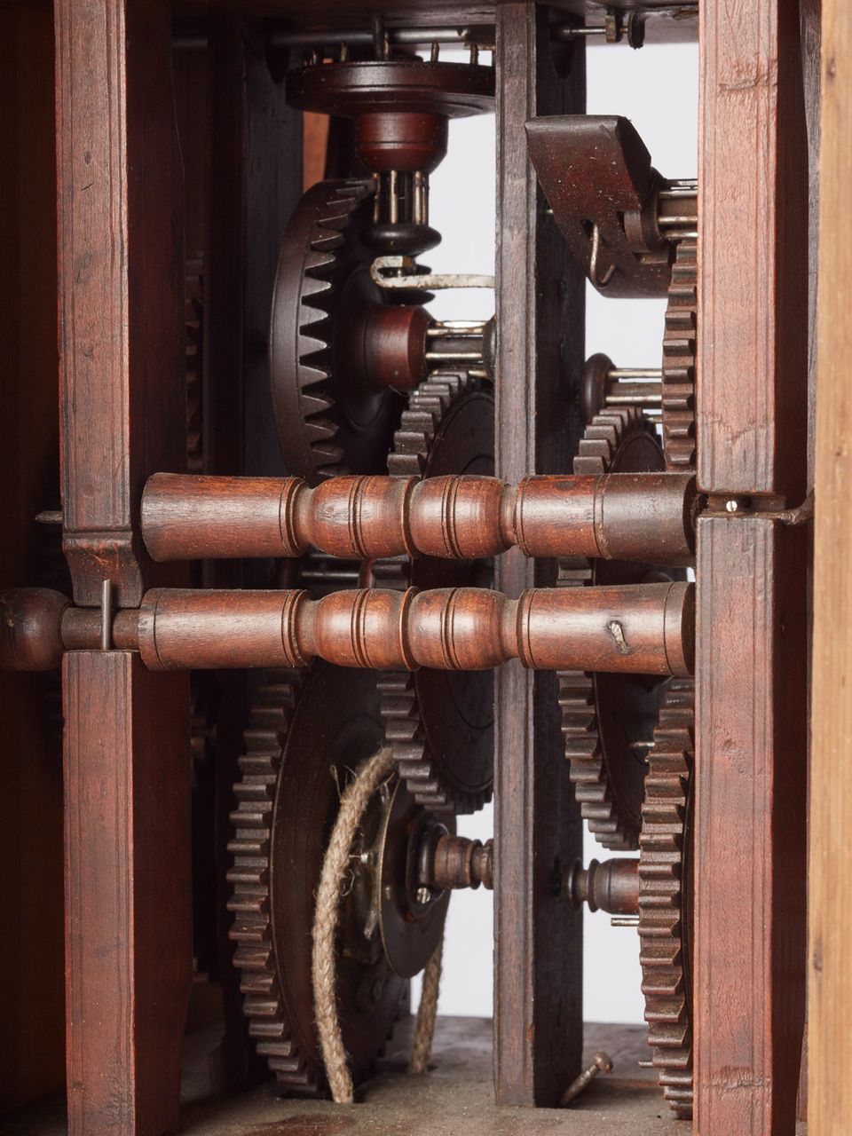 A German Wall Clock with ‘cow’s-tail pendulum’ and wooden wheels circa 1800 - image 2