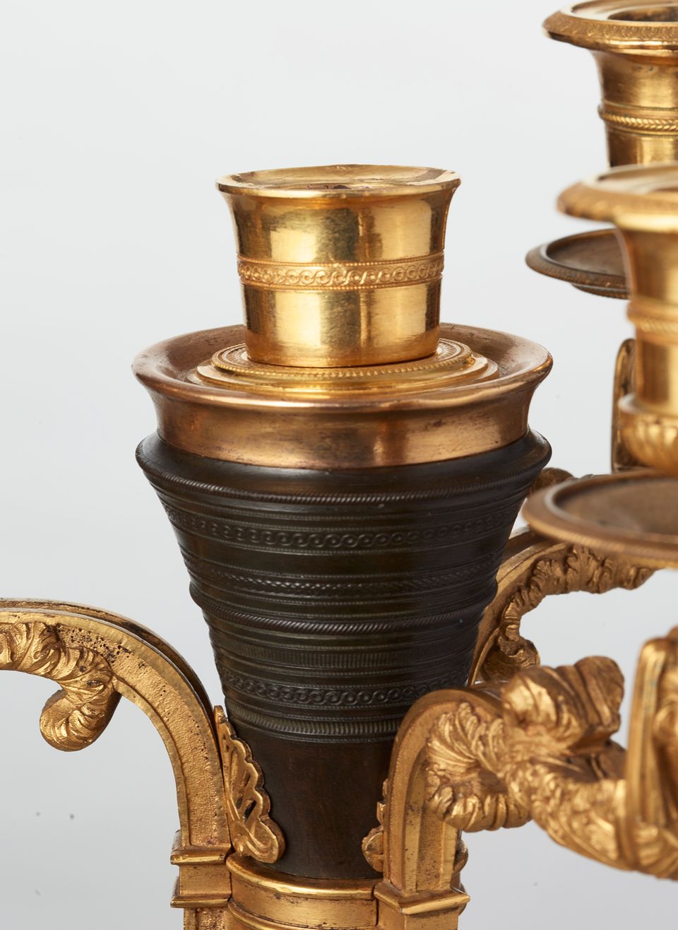 A rare pair of European four-light gilt bronze ‘Directoire’ candlesticks, circa 1810 - image 5