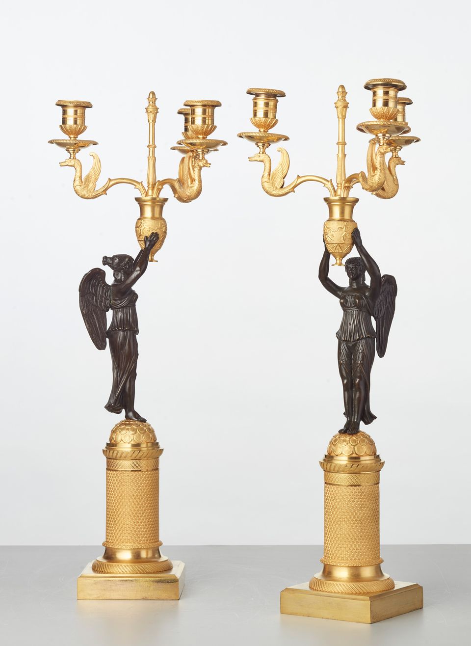 A pair of French gilt candlesticks with patinated bronze angels, circa 1820 - image 2