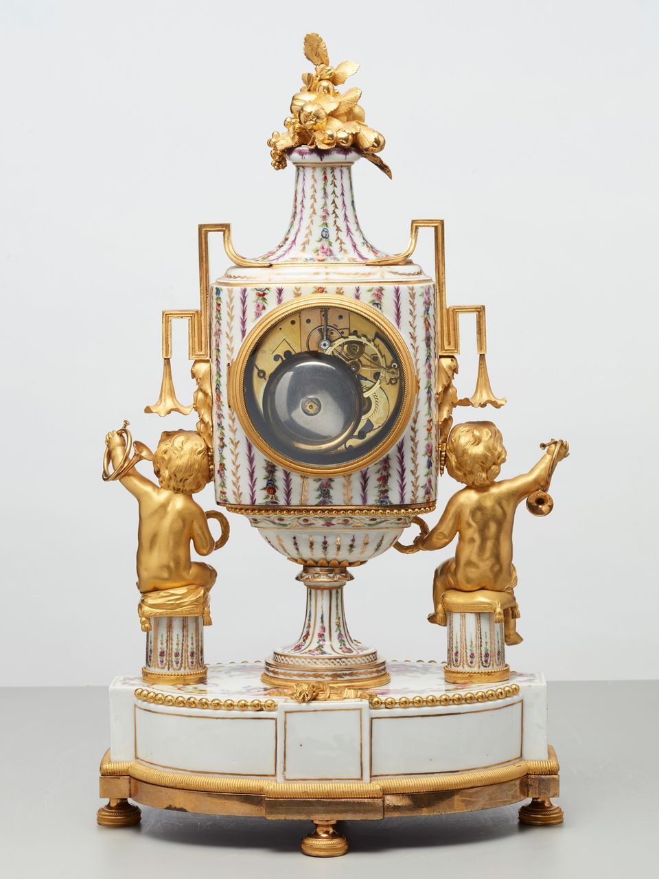 Rare French porcelain and gilt bronze mantel clock by Godon, circa 1785 - image 5