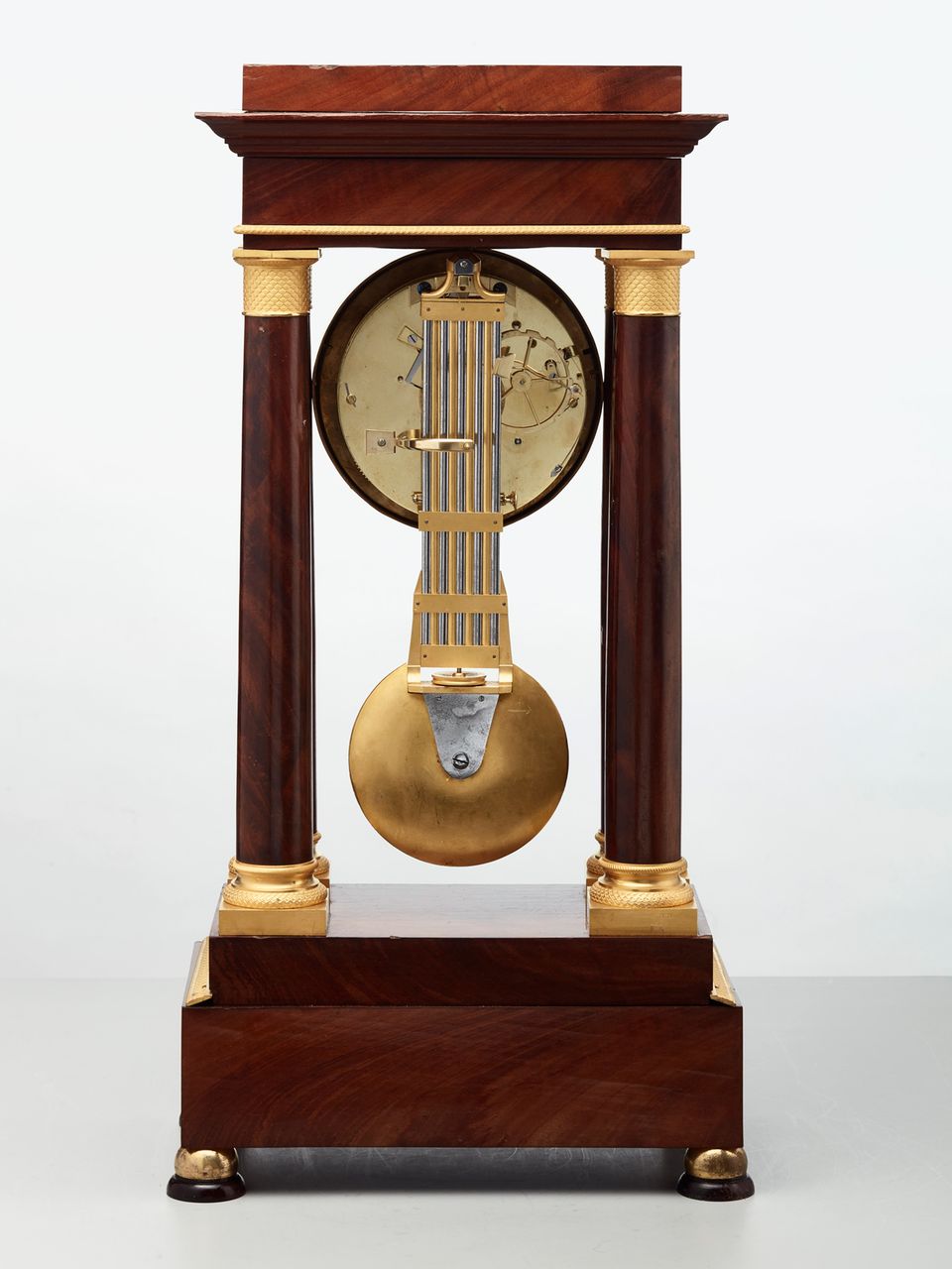 A French mahogany regulator ‘portico’ mantel clock by Montassier, circa 1820 - image 7