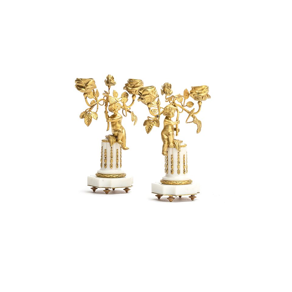 A cute pair of romantic small candlesticks featuring two small kids sitting on a white marble base - image 2