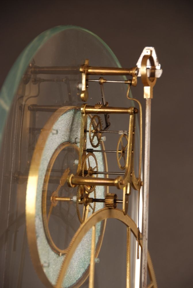 S06 A glass mounted skeleton clock - image 6